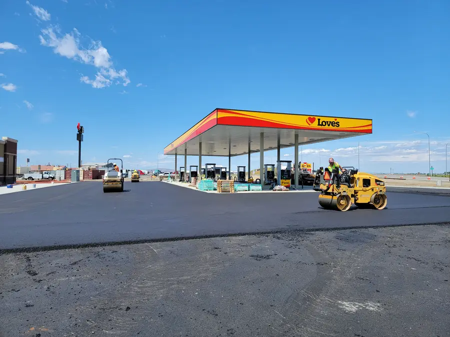 Rollers working on new asphalt at a Love’s fuel station