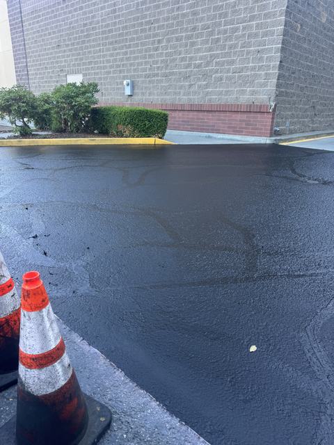 Retail center in Edmonds, WA: crack seal and sealcoat (photo 3)