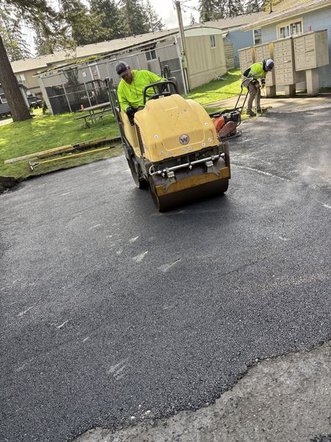 Manufactured home community in Lakewood, WA: paving, sealcoat and striping (photo 1)