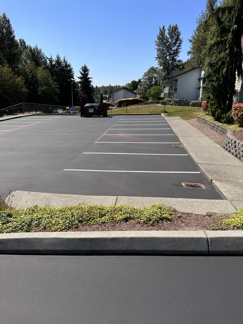 Housing community in Lynnwood, WA: sealcoat and striping (photo 1)