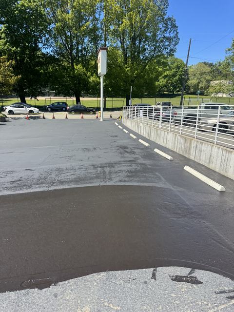 Retail lot in Seattle, WA: crack seal, sealcoat and striping (photo 2)