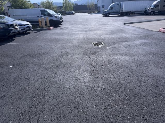 Business park in Sumner, WA: sealcoat and ada striping (photo 1)